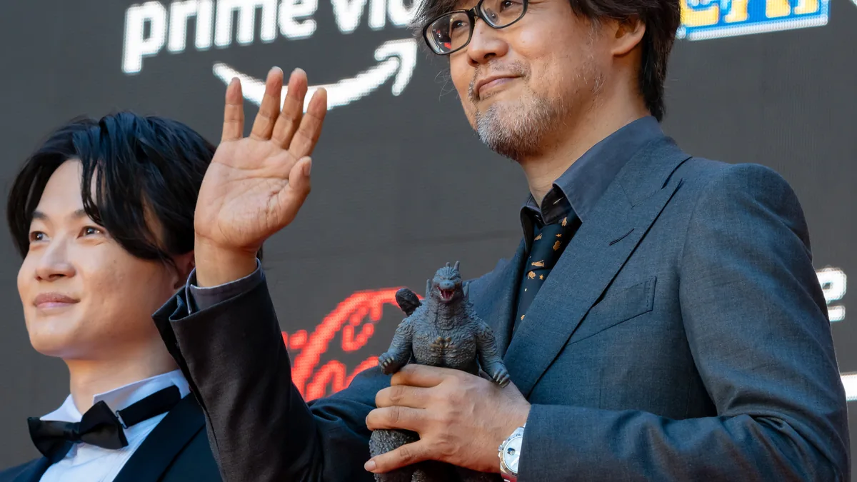 Takashi Kamiki and Takashi Yamazaki on the red carpet for Godzilla Minus One at the 2023 Tokyo International Film Festival; festival photograph, not a Godzilla Minus Zero still